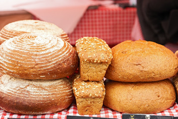 Assortment of baked bread on table