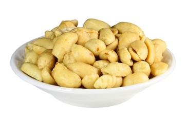 A plate of slated peanuts on a white background