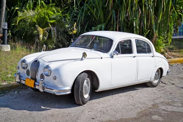 Printed roller blinds Cuban vintage cars Classic white Jaguar ,Havana. Cuba