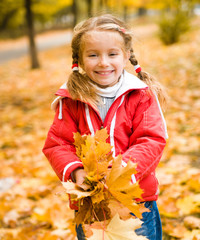 Autumn portrait of cute little  girl