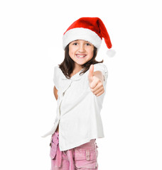 little girl in the santa claus hat