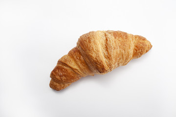 one croissant isolated on white