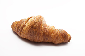 one croissant pastry isolated on white