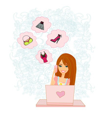 women purchasing product online using her laptop computer