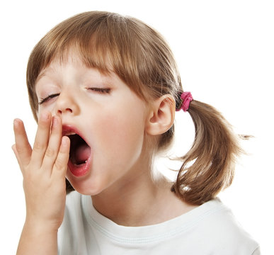 a tired little girl yawning Stock Photo | Adobe Stock