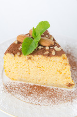 a piece of pumpkin cheesecake close up vertical