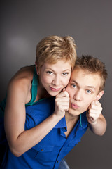 Attractive cute couple. Two in the studio