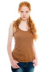 Obraz premium Fashion shot of pretty girl with long red hair against white.