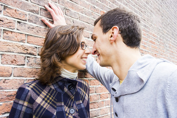 Portrait of love couple outdoor looking happy