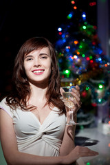 smiling woman holding wineglass