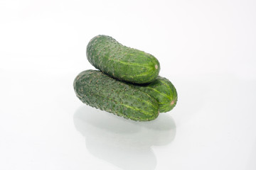 green cucumbers isolated on white