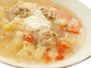 soup with noisettes and cauliflower over white