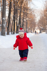 Fototapeta na wymiar toddler in winter park
