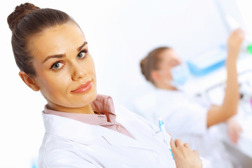 Team of scientists working in laboratory
