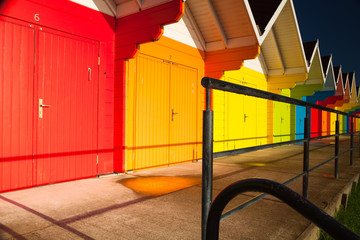 Detail of beach huts at sunrise