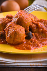Meatballs with tomato sauce.