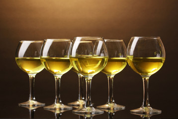 Wineglass on brown background