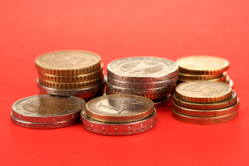 euro coins on color background