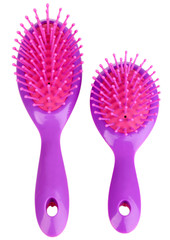 two purple hair brushes isolated on white