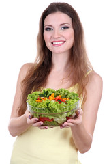 Beautiful woman with vegetable salad isolated on white