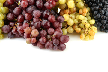 assortment of ripe sweet grapes isolated on white.