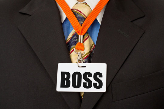 Geschäftsmann mit Ausweis am Schlüsselband -Boss, Chef