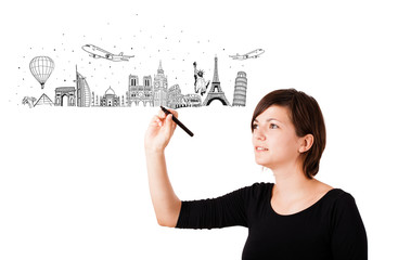 Young woman drawing famous cities and landmarks on whiteboard