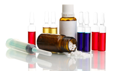medical ampules, bottles and syringes, isolated on white