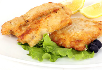 Fish fried on salad sheet