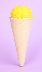 Banana ice cream with cone on lilac background