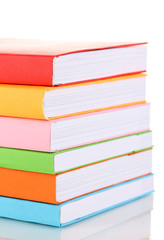 Stack of multicolor books  isolated on white