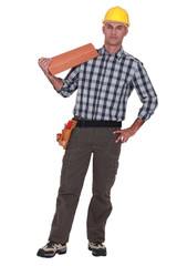 Roofer stood with tiles