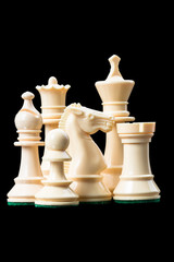 White chess pieces on black