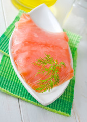 Fresh salmon in the white bowl