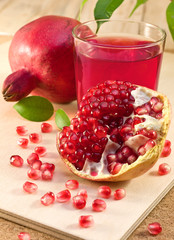 ripe pomegranate and pomegranate juice