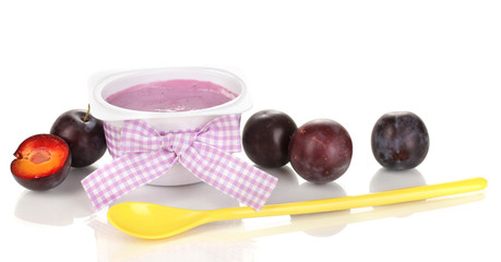 Yogurt with blueberries and plums isolated on white