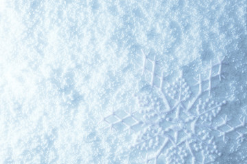 Snowflakes on snow