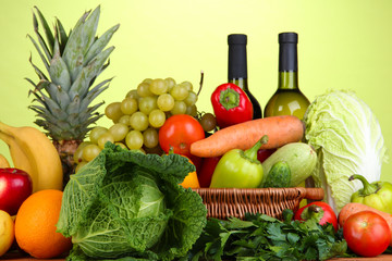 Composition with vegetables  and fruits in wicker basket