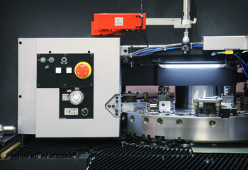 CNC punching machine with metal sheet