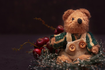 Christmas arrangement with a teddy bear