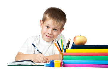 nice kid with books and pencils