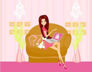 Online shopping - young smiling woman sitting with laptop compu