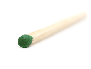 match with a green head isolated on white