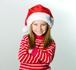 little girl in the santa claus hat