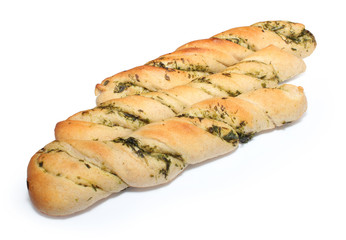 Twisted crisp bread with herbs, isolated on white