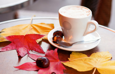 Cup of coffee and baked chestnuts