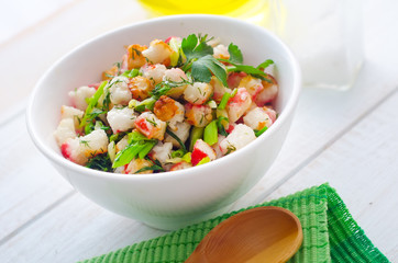 Fresh salad with greens and seafood