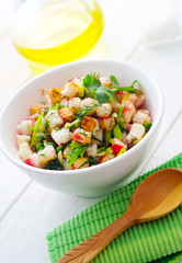 Fresh salad with greens and seafood