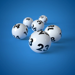 Lottokugeln auf blauem Hintergrund
