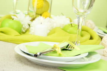 beautiful holiday table setting with apples, close up